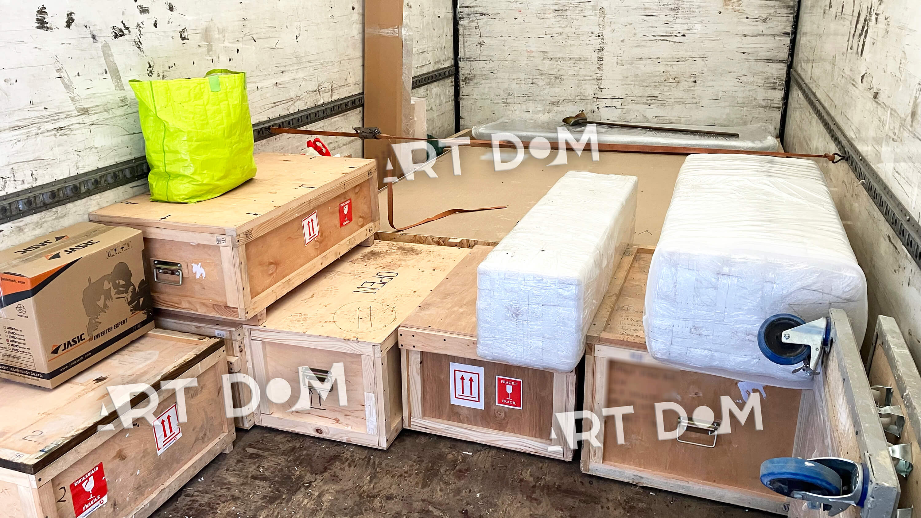 packaging of paintings and sculptures for delivery abroad